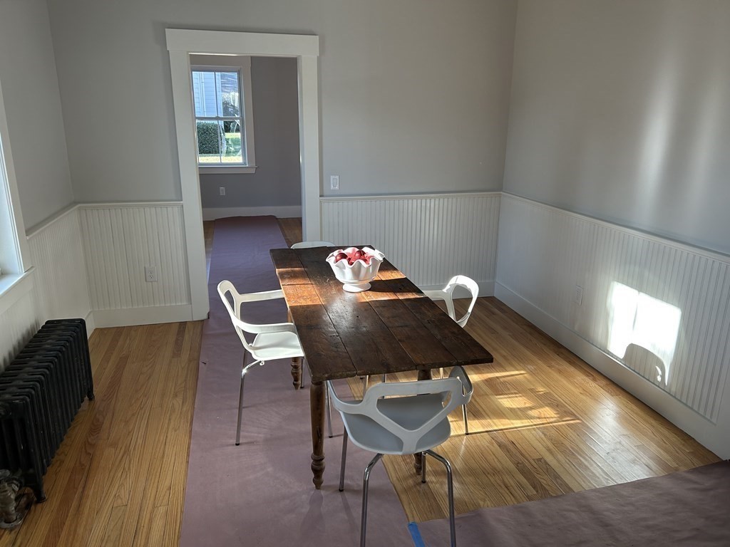 2 Burnside Street Maynard, MA 01754 - Photo 10 of 21 a living room with furniture and a lamp