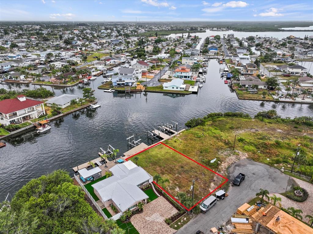 6200 Lonnie Lee Lane Hudson, FL 34667 - Photo 12 of 13 an aerial view of residential houses with outdoor space
