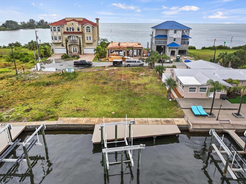 6200 Lonnie Lee Lane Hudson, FL 34667 - Photo 4 of 13 a view of a swimming pool with outdoor seating space