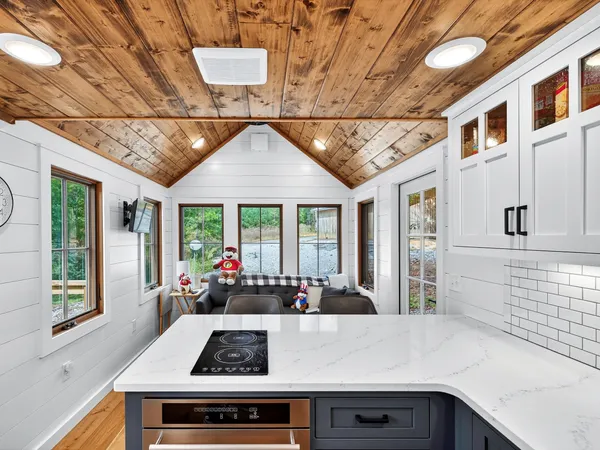 a kitchen with a sink and cabinets