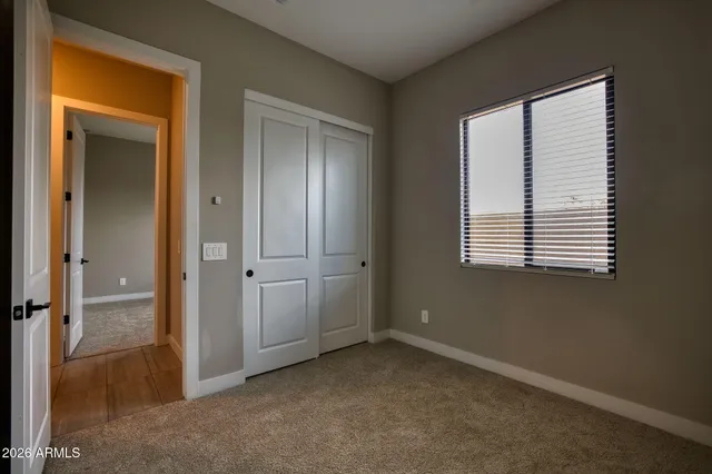 an empty room that has a window