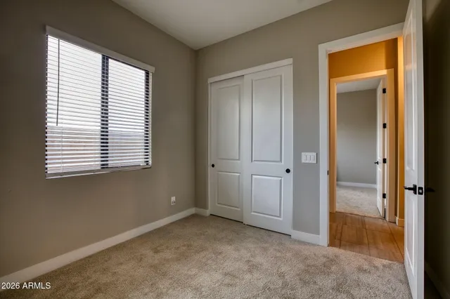 an empty room that has a window