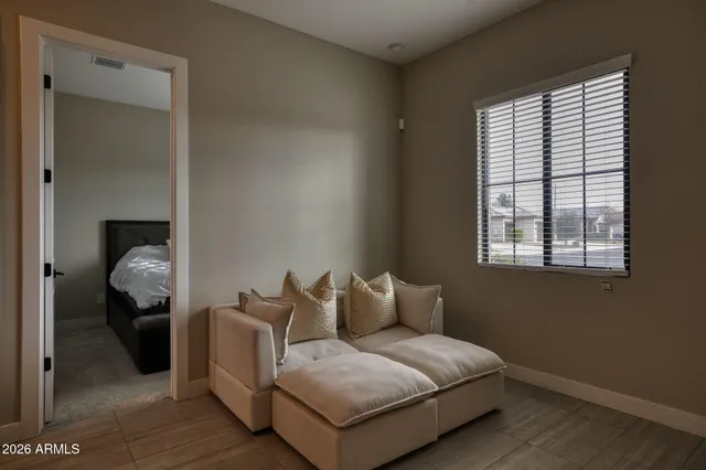 a room with a bed and a window