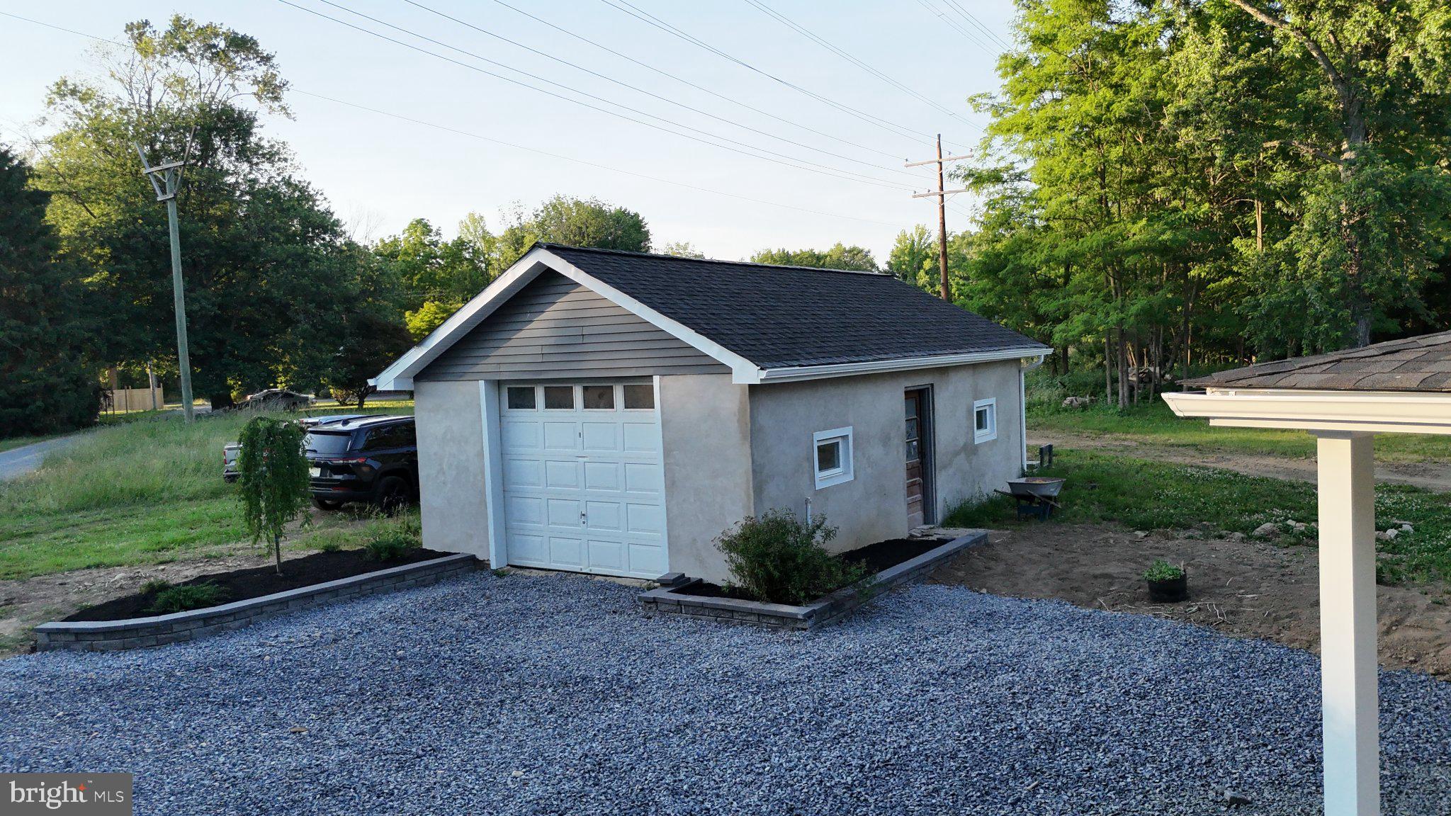 271 Friendship Road Cranbury, NJ 08512 - Photo 24 of 25 Charming garage nestled in nature.