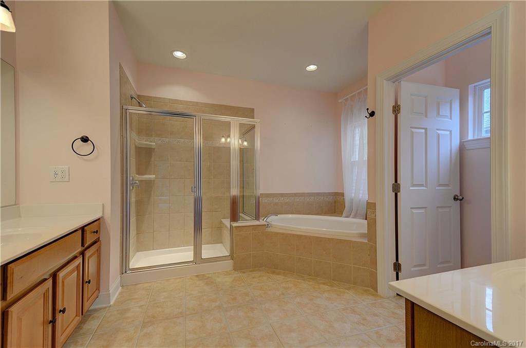 716 Beille Lane Fort Mill, SC 29708 - Photo 14 of 24 a bathroom with a tub shower and sink