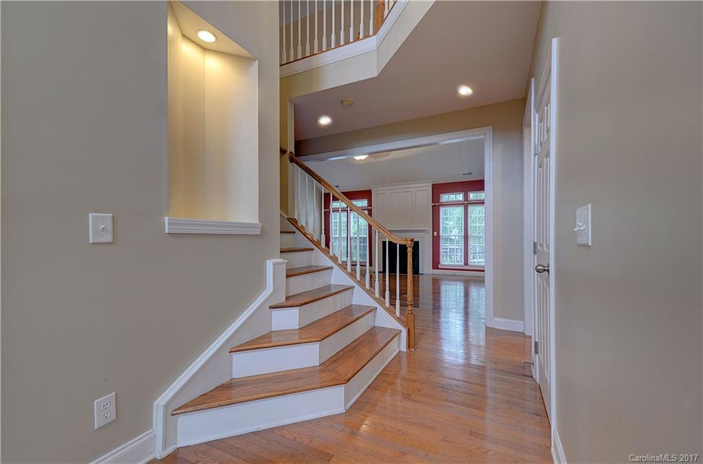 716 Beille Lane Fort Mill, SC 29708 - Photo 16 of 24 a view of entryway and hall with wooden floor