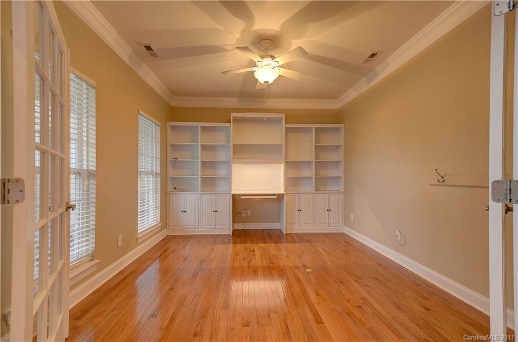 716 Beille Lane Fort Mill, SC 29708 - Photo 3 of 24 wooden floor in an empty room with a window