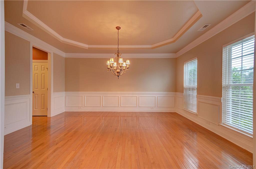 716 Beille Lane Fort Mill, SC 29708 - Photo 4 of 24 a view of empty room with wooden floor and fan