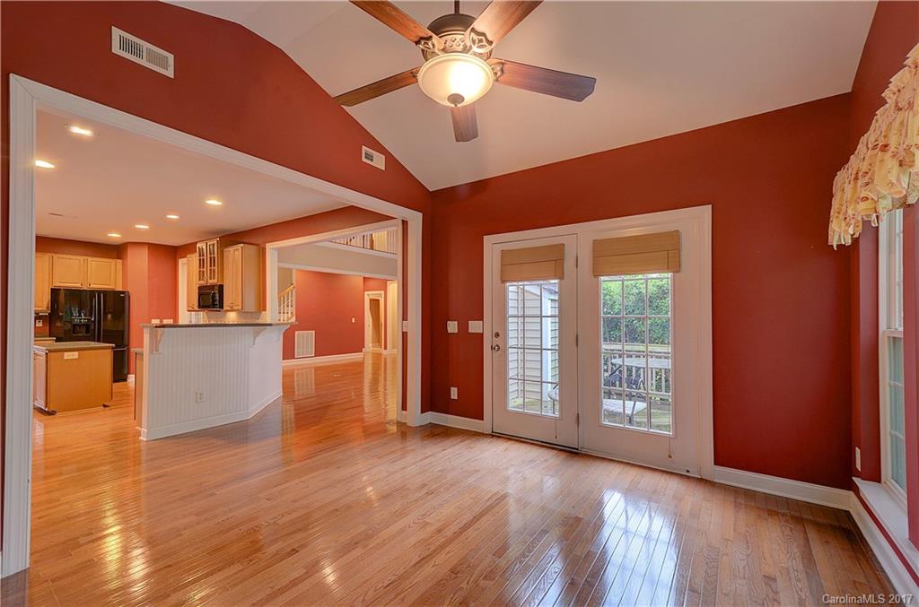 716 Beille Lane Fort Mill, SC 29708 - Photo 9 of 24 a view of an empty room with kitchen and a window