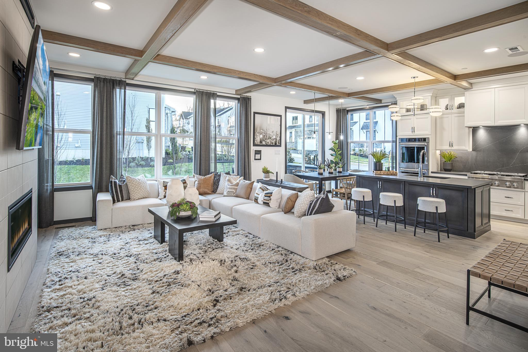 0 The Willis Elite Malvern, PA 19355 - Photo 11 of 19 a living room with furniture and large windows