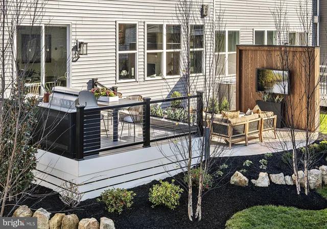 a view of house with outdoor seating