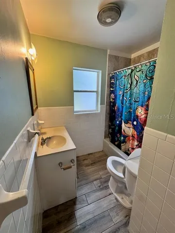 a bathroom with a sink and a toilet