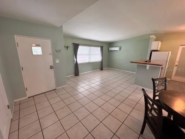 a workspace with furniture and window