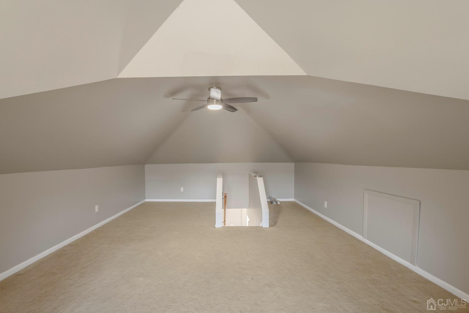 49 Riva Avenue, Unit 2 Milltown, NJ 08850 - Photo 19 of 22 an empty room with an entryway