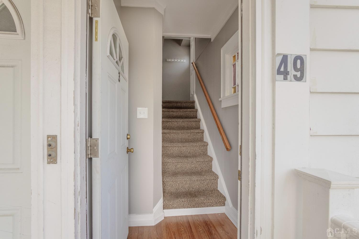 49 Riva Avenue, Unit 2 Milltown, NJ 08850 - Photo 21 of 22 a view of staircase with white walls