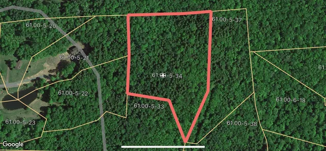 a view of a fence and a floor to ceiling window