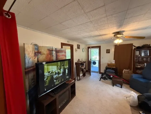 a view of a backyard with furniture