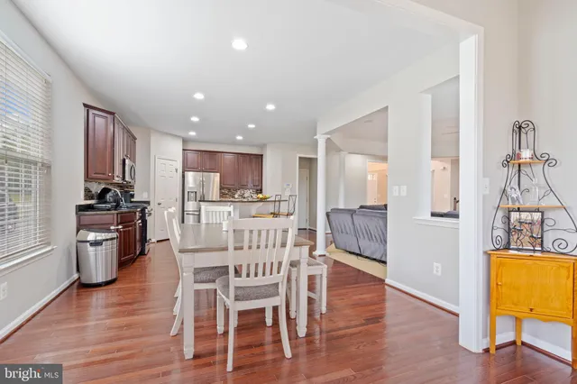 a view of workspace with wooden floor