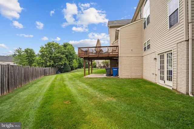 a view of a livingroom with furniture and window