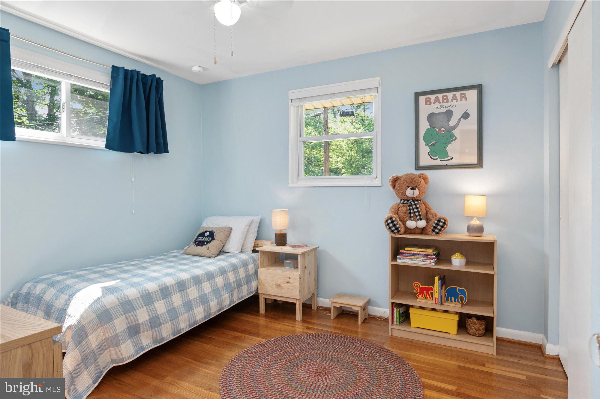 11201 Lombardy Road Silver Spring, MD 20901 - Photo 16 of 31 a bedroom with bed and a window