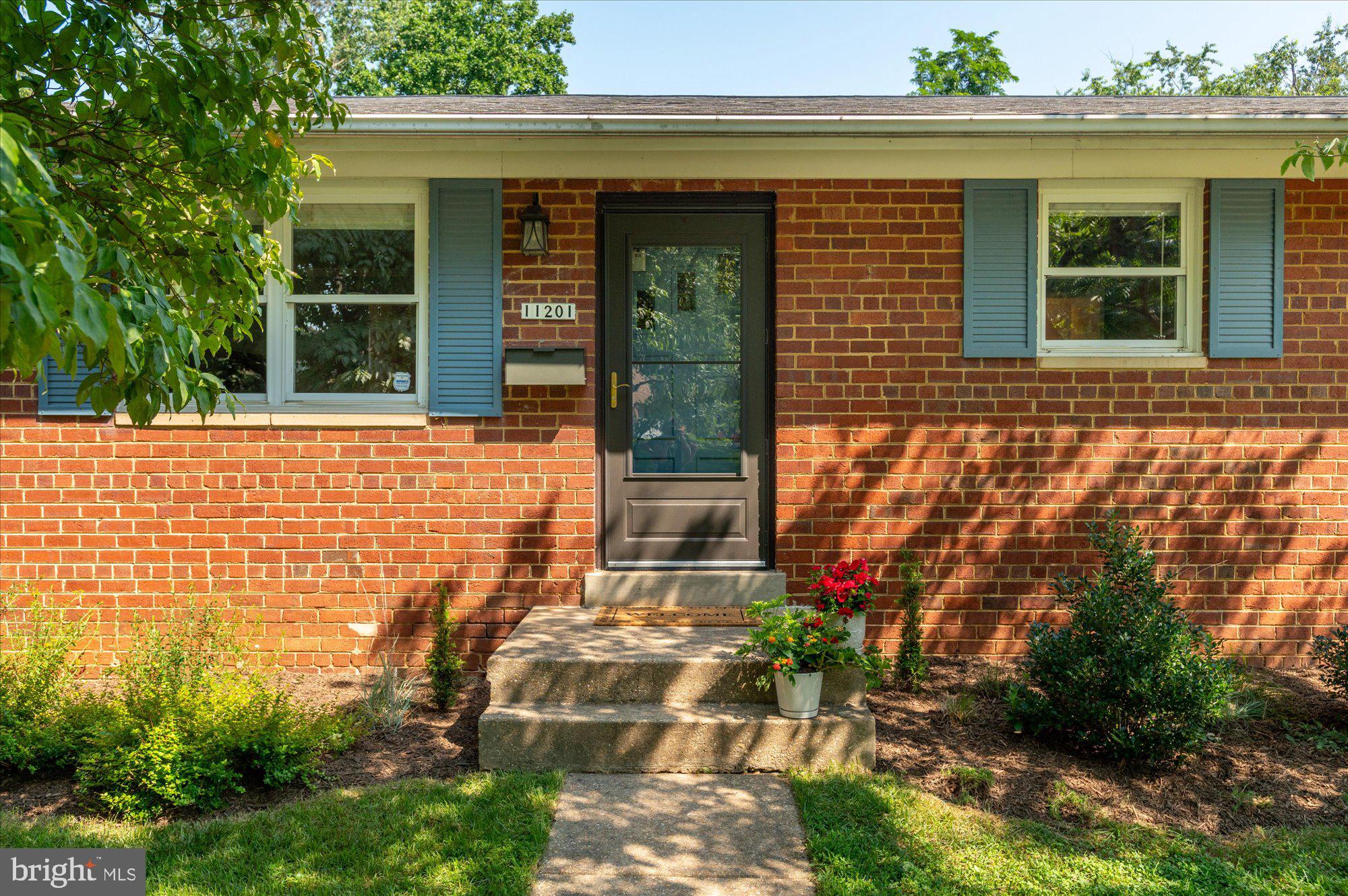 11201 Lombardy Road Silver Spring, MD 20901 - Photo 2 of 31 a front view of a house