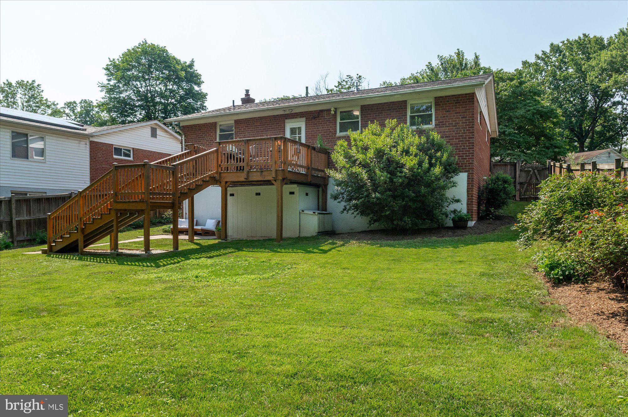 11201 Lombardy Road Silver Spring, MD 20901 - Photo 29 of 31 a view of a house with a yard and sitting area
