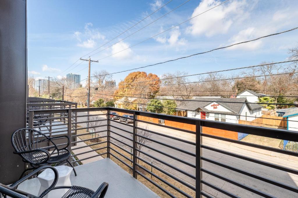 49 Navasota Street, Unit 201 Austin, TX 78702 - Photo 2 of 13 Balcony featuring a residential view