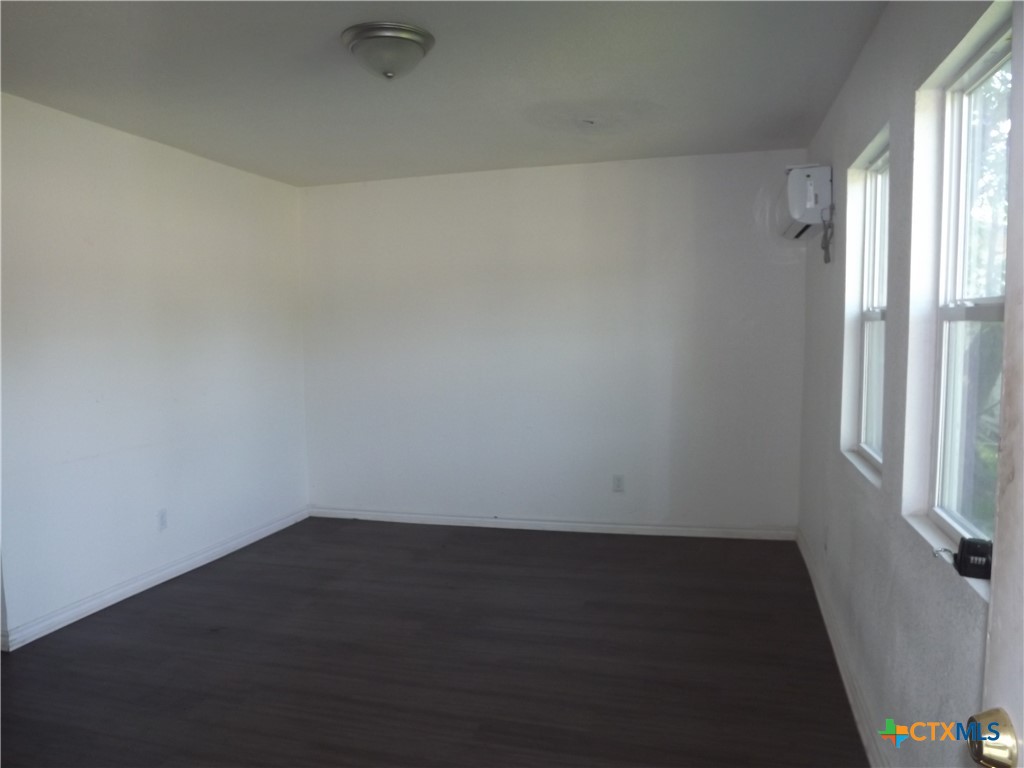 1714 Duncan Avenue Killeen, TX 76541 - Photo 4 of 24 an empty room with a window