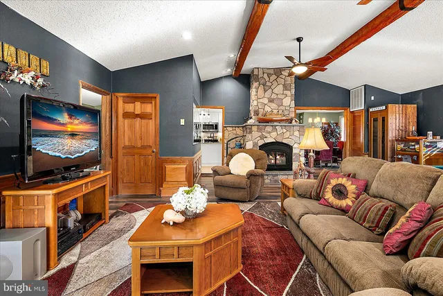 a bed room with a bed and a television