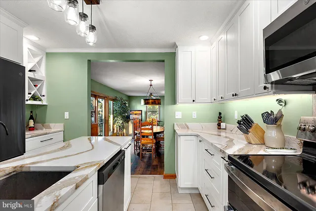a bathroom with a sink a mirror and a shower