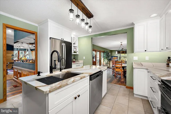 a bathroom with a shower and a sink