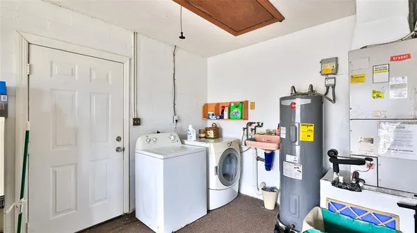 a view of living room with washer and dryer