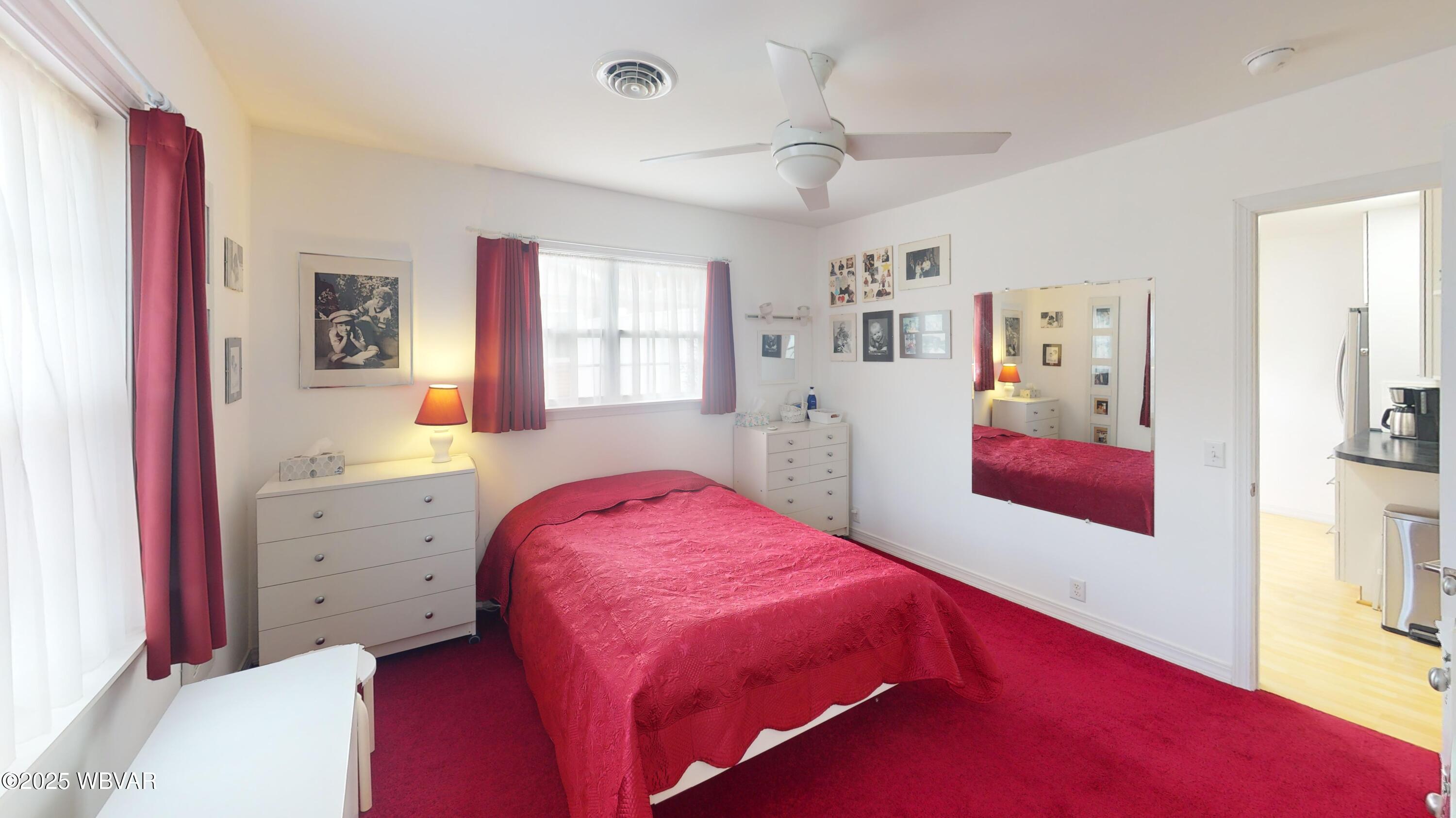 2446 Ritchey Street Williamsport, PA 17701 - Photo 9 of 17 Relax in the cozy, modern bedroom complete with a private ensuite bath and roomy walk-in closet?your perfect personal retreat.