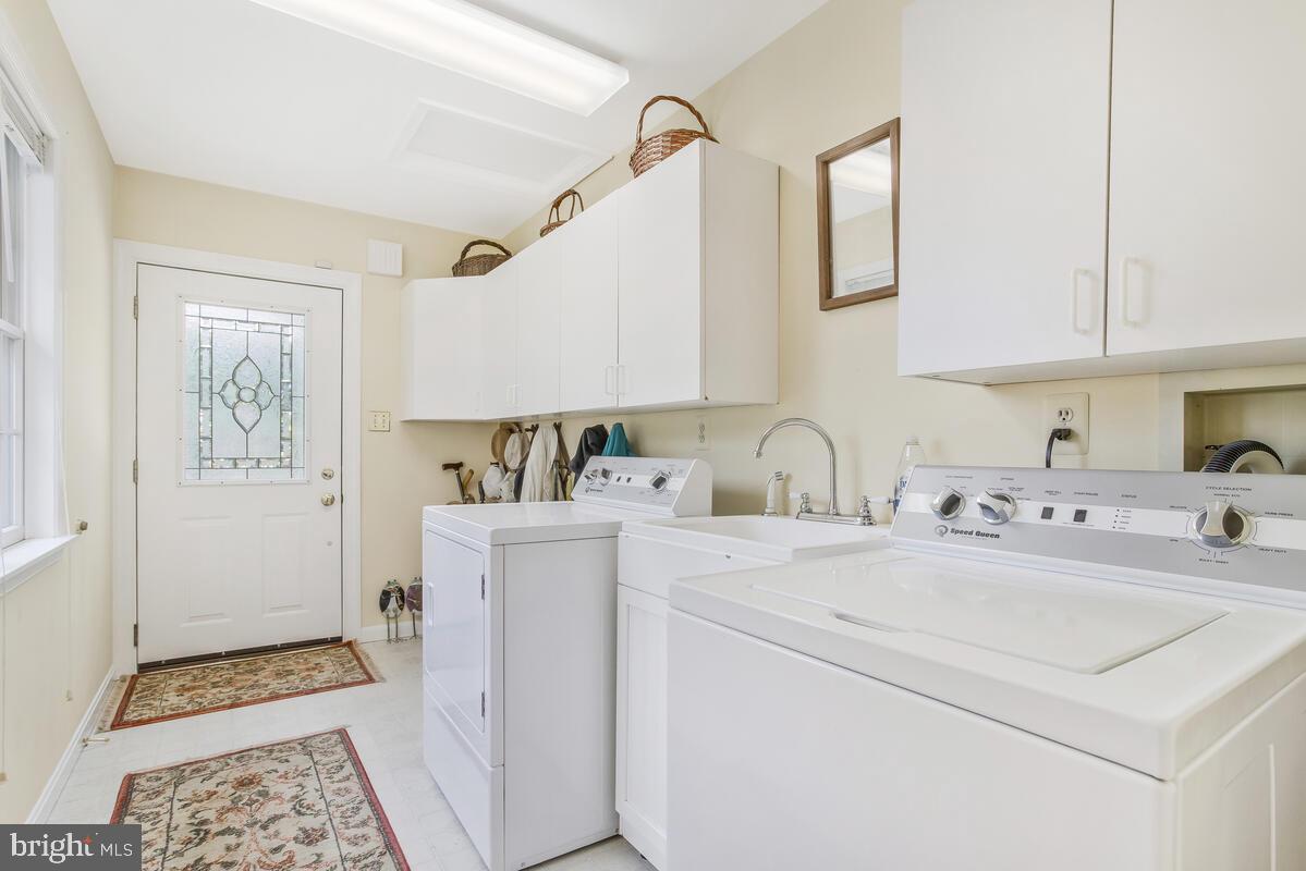 6233 Medora Road Linthicum Heights, MD 21090 - Photo 27 of 58 Mudroom and laundry for easy cleanup!
