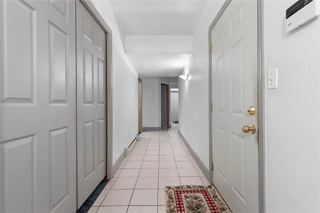 a utility room with sink dryer and washer