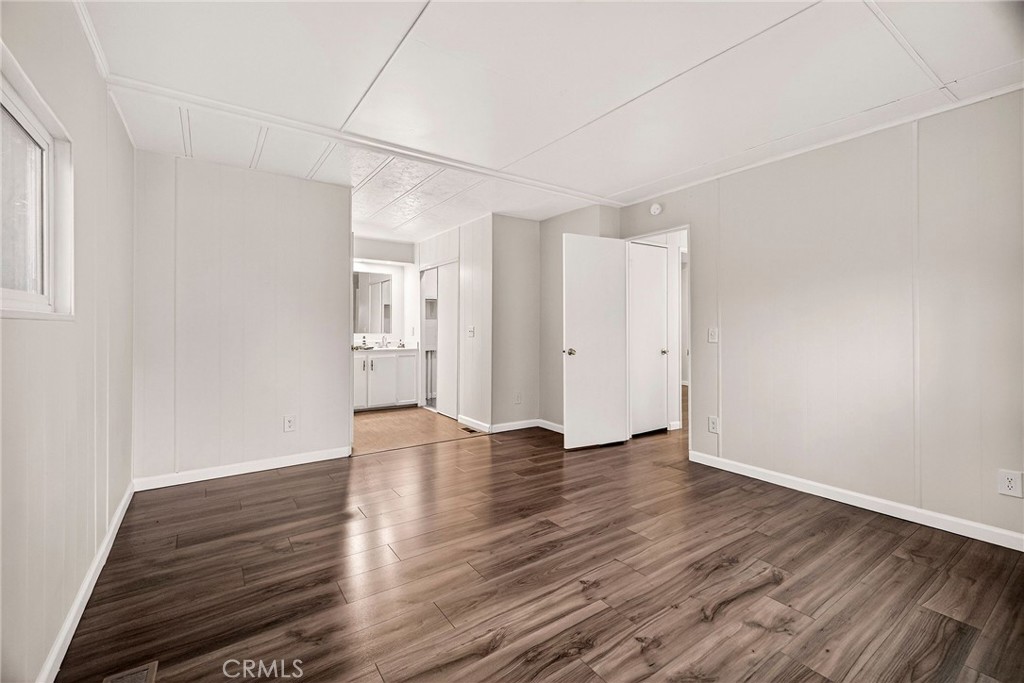 3548 Vía Medio Chico, CA 95973 - Photo 15 of 48 a view of an empty room with wooden floor