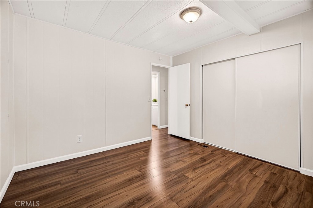 3548 Vía Medio Chico, CA 95973 - Photo 22 of 48 a view of an empty room with wooden floor