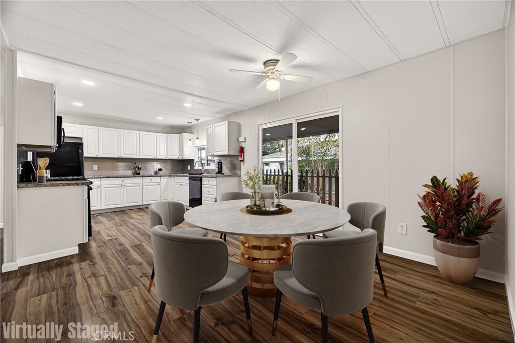 3548 Vía Medio Chico, CA 95973 - Photo 24 of 48 a view of a dining room with furniture window and wooden floor