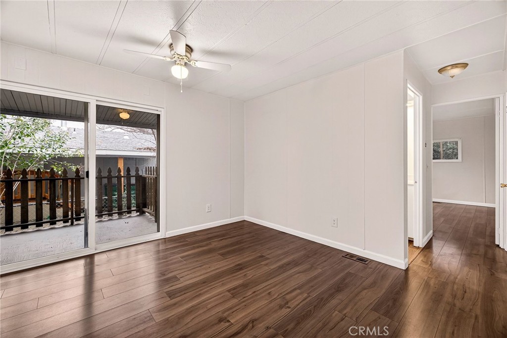 3548 Vía Medio Chico, CA 95973 - Photo 28 of 48 wooden floor in an empty room with a window