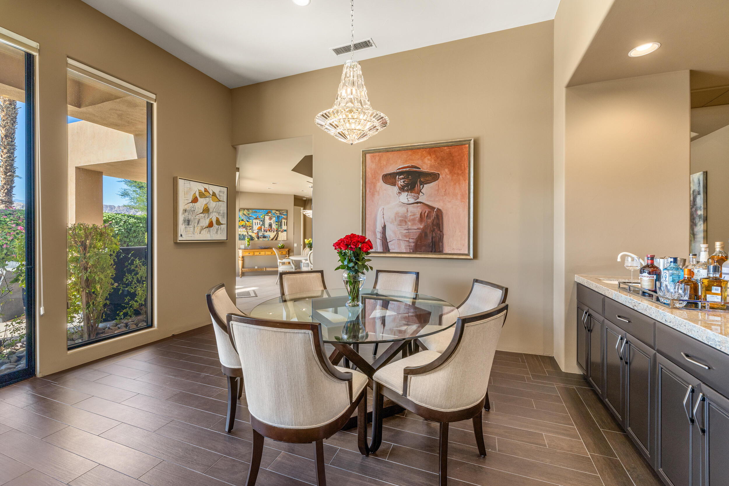 50445 Mountain Shadows Road La Quinta, CA 92253 - Photo 7 of 33 a dining room with furniture and wooden floor