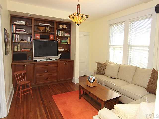 706 North East Street Raleigh, NC 27604 - Photo 3 of 14 Fabulous built-in bookcase accents this cozy family room with adjoining full bath. Den/Family/Great Room