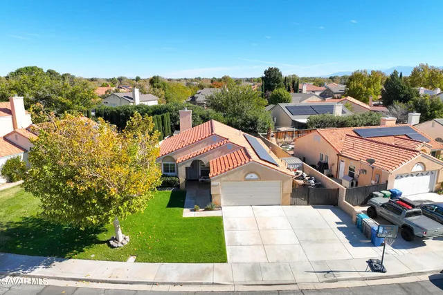 a view of a street with houses
