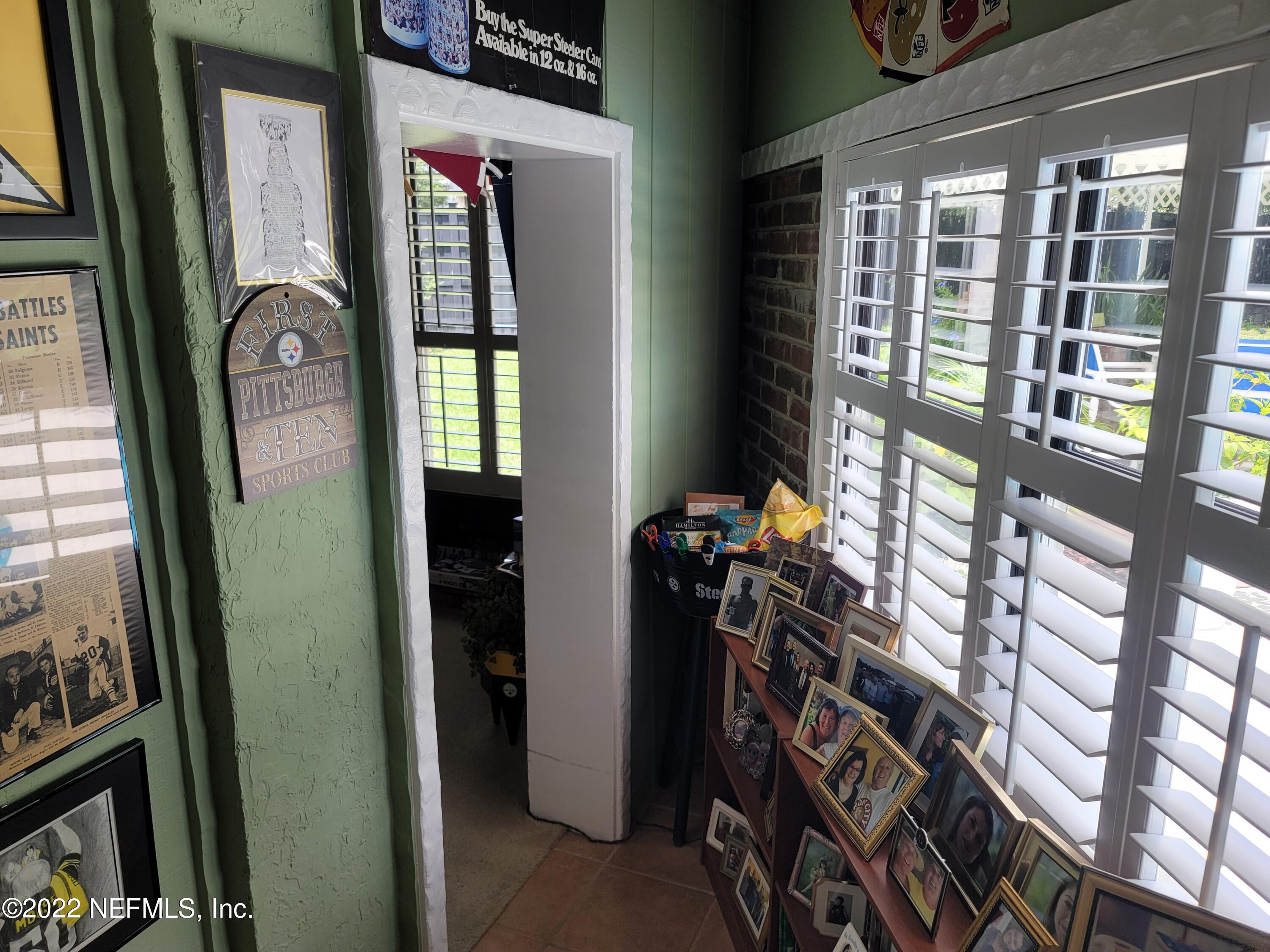 5765 Richmond Road Jacksonville, FL 32210 - Photo 41 of 73 41 - Door to Bar Room