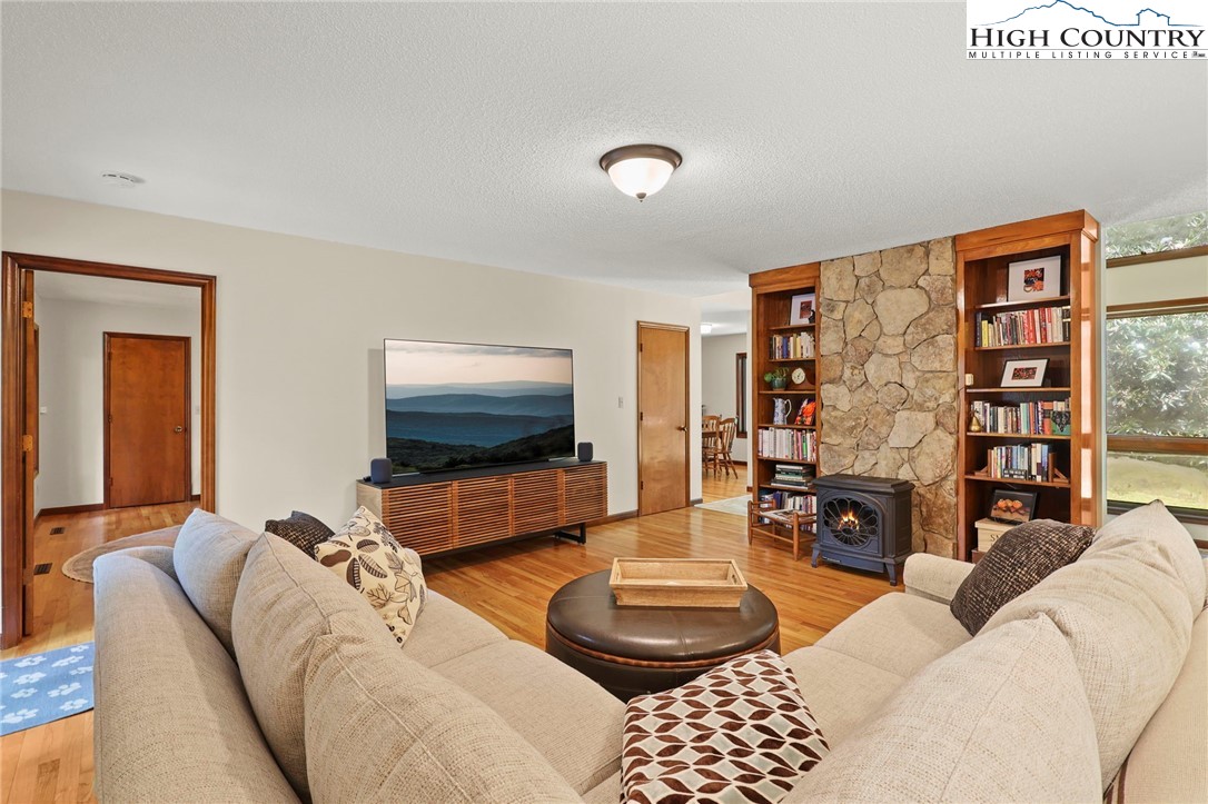 393 Trillium Ridge Boone, NC 28607 - Photo 11 of 50 a living room with furniture and a flat screen tv