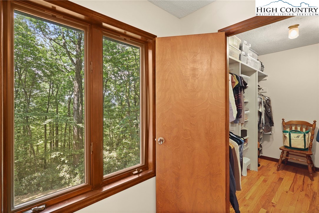 393 Trillium Ridge Boone, NC 28607 - Photo 27 of 50 a view of walk in closet with clothes and shoes