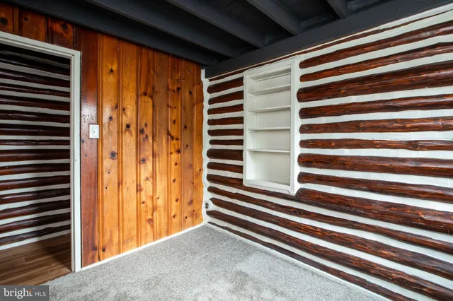 a view of a room that has a large window