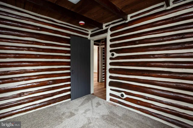 a view of room and front door