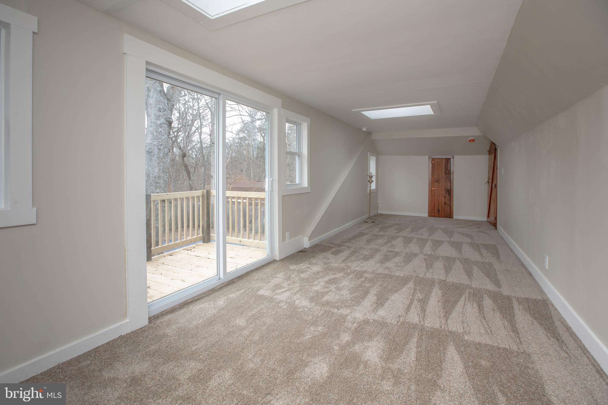 100 Rancocas Boulevard Mount Laurel, NJ 08054 - Photo 24 of 28 a view of a big room with windows and chandelier fan