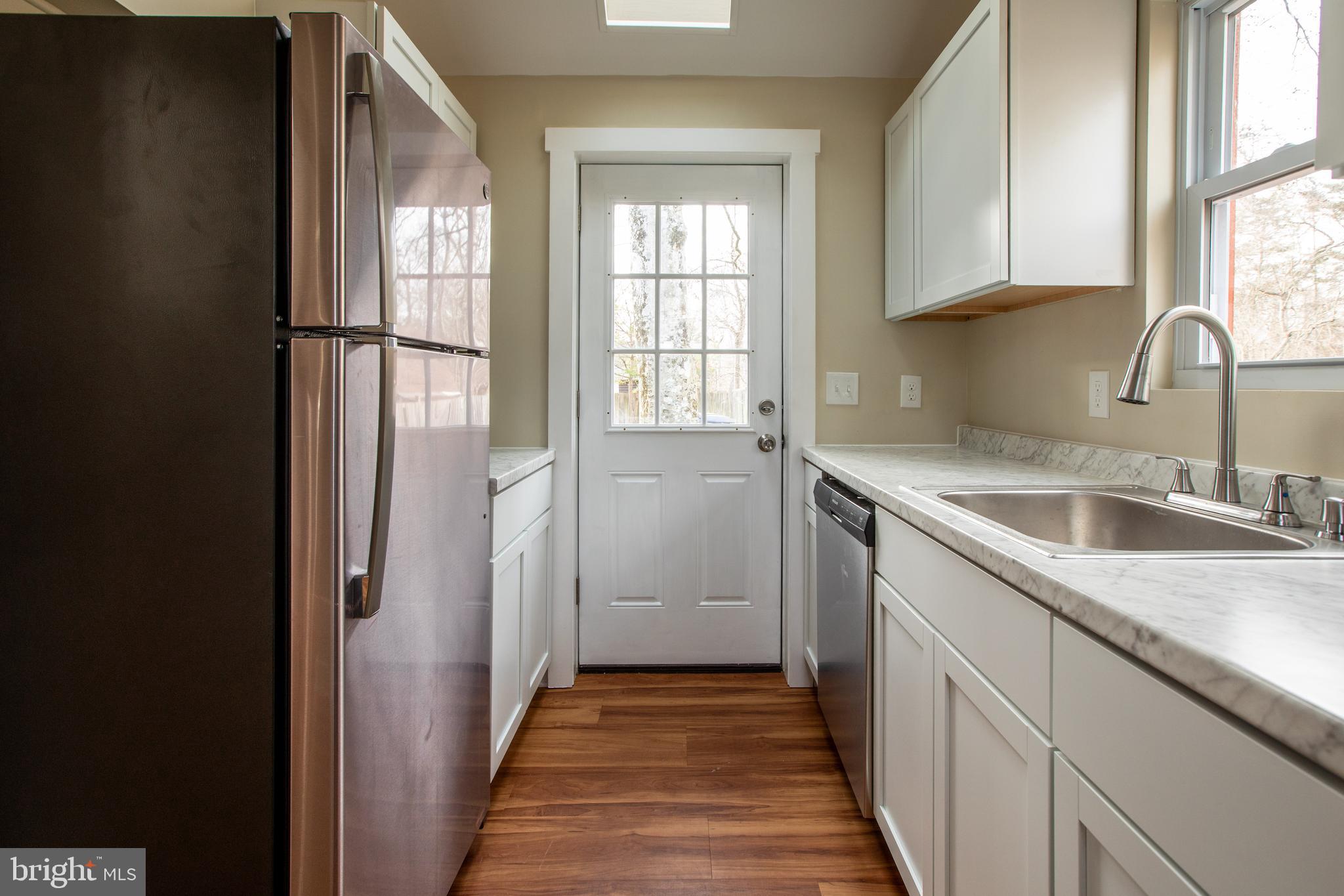 100 Rancocas Boulevard Mount Laurel, NJ 08054 - Photo 10 of 28 a kitchen with a sink and a window