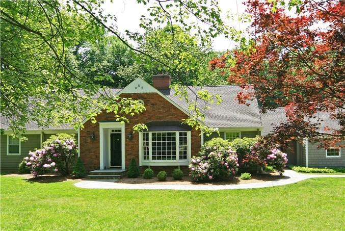 130 Indian Cave Road Ridgefield, CT 06877 - Photo 1 of 1 front view of a house with a yard